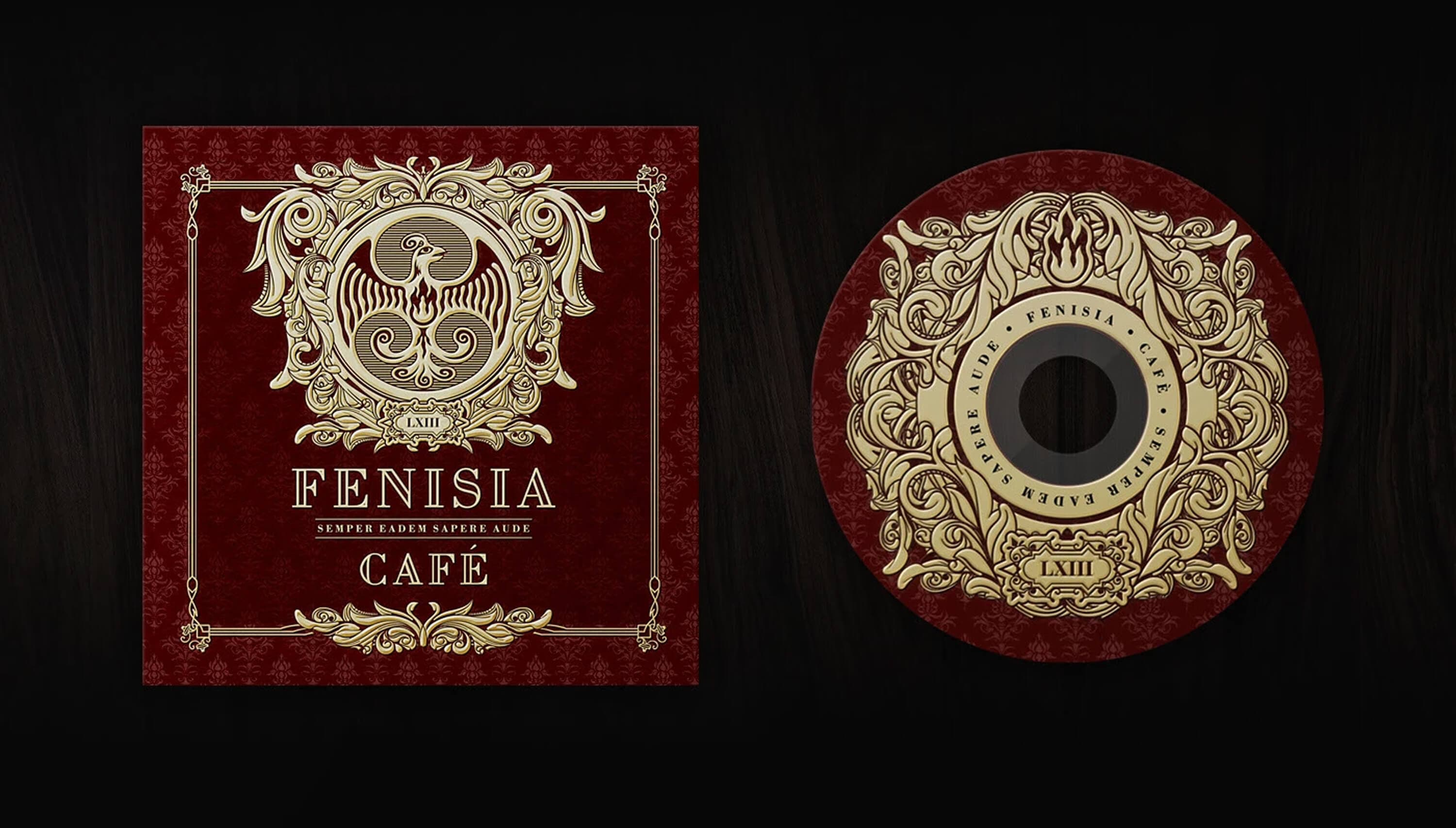 The CD packaging — the deep red cover with the gold phoenix crest and the Fenisia Cafe wordmark, beside the printed disc carrying the same ornament
