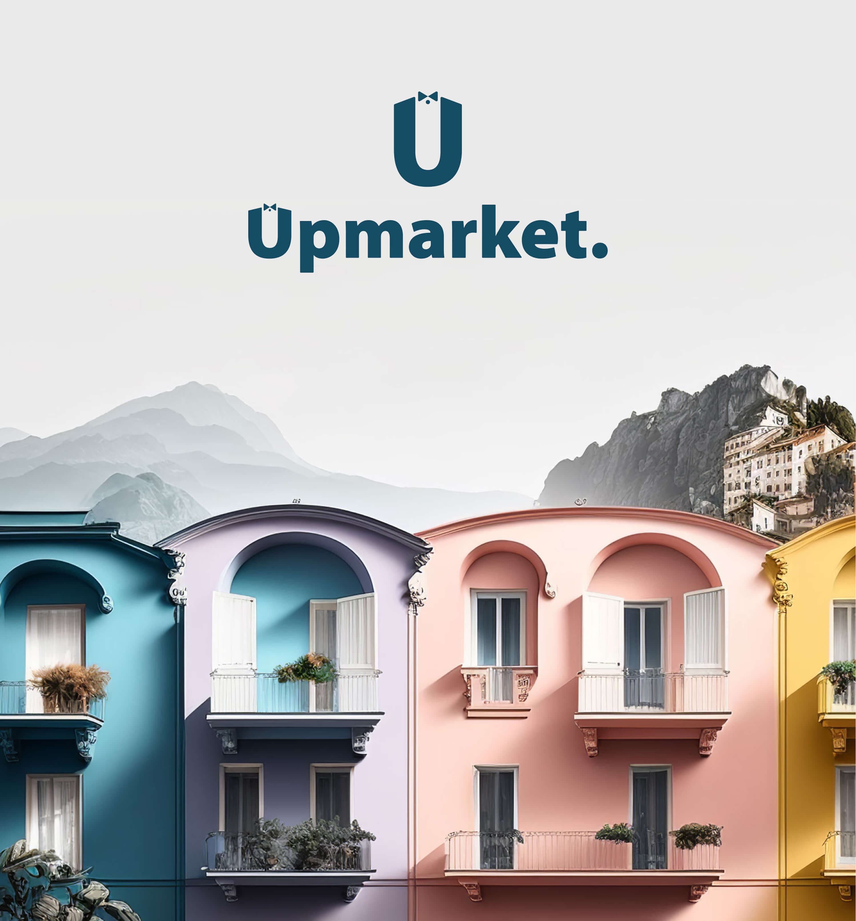 The brand in context — the monogram and wordmark above a row of pastel Mediterranean housefronts with arched windows and balconies, under a misty mountain